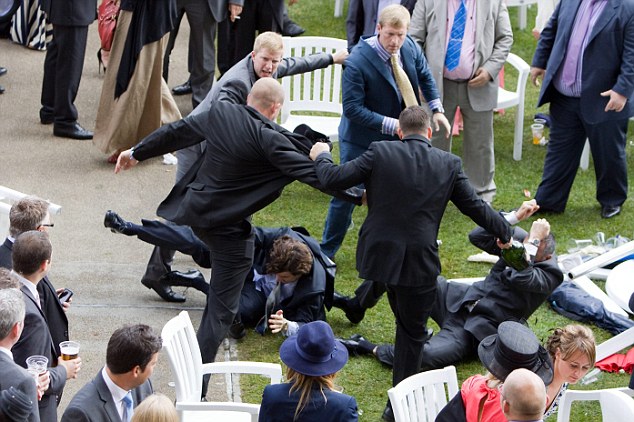 ©INS News Agency Ltd..16/06/2011 Racegoers at Ladies Day, Royal Ascot, become involved in brawl involving Champgne bottles and broken chair legs as other punters watch in amzement. Pictures by Ben Russell See copy catchlined INSbrawl.